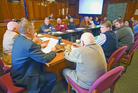 Moscow Mayor Bill Lambert, left, talks on Wednesday during a workshop at Moscow City Hall, held to learn more about oversized loads that Mammoet USA South has proposed shipping up U.S. Highway 95 from Lewiston (Moscow-Pullman Daily News/Geoff Crimmins photo).